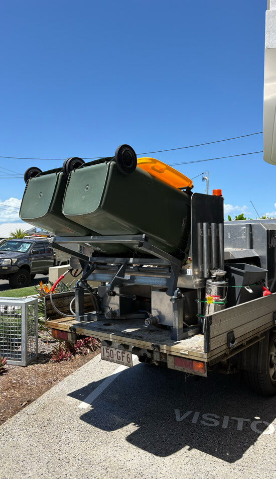 JuiceJet lifting residential bins