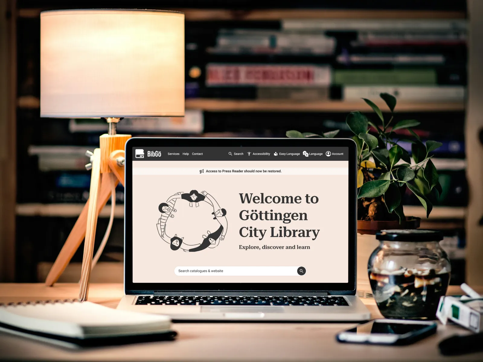 Mockup; Laptop showing of the BibGö homepage.