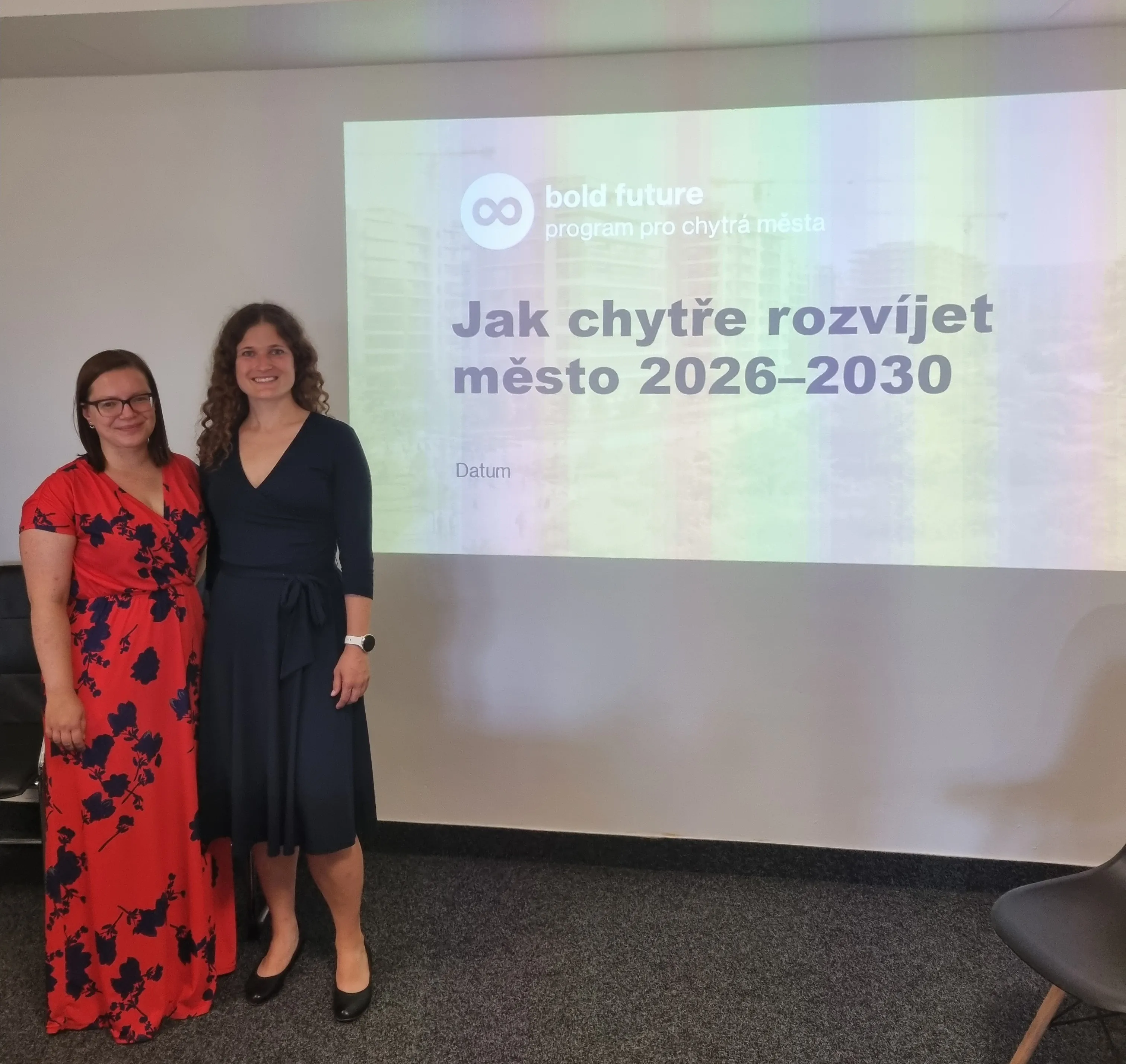Image with two women and text about smart city development program 2026–2030.