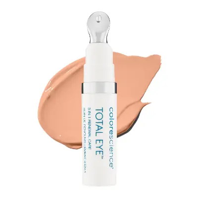 Colorescience Total Eye 3-in-1 tinted eye sunscreen SPF 35 in peach tube with metal cooling applicator, mineral eye cream with dark circle coverage