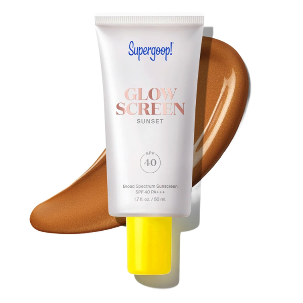 The best glowy tinted sunscreen for dark skin by Supergoop 2026 on a white background