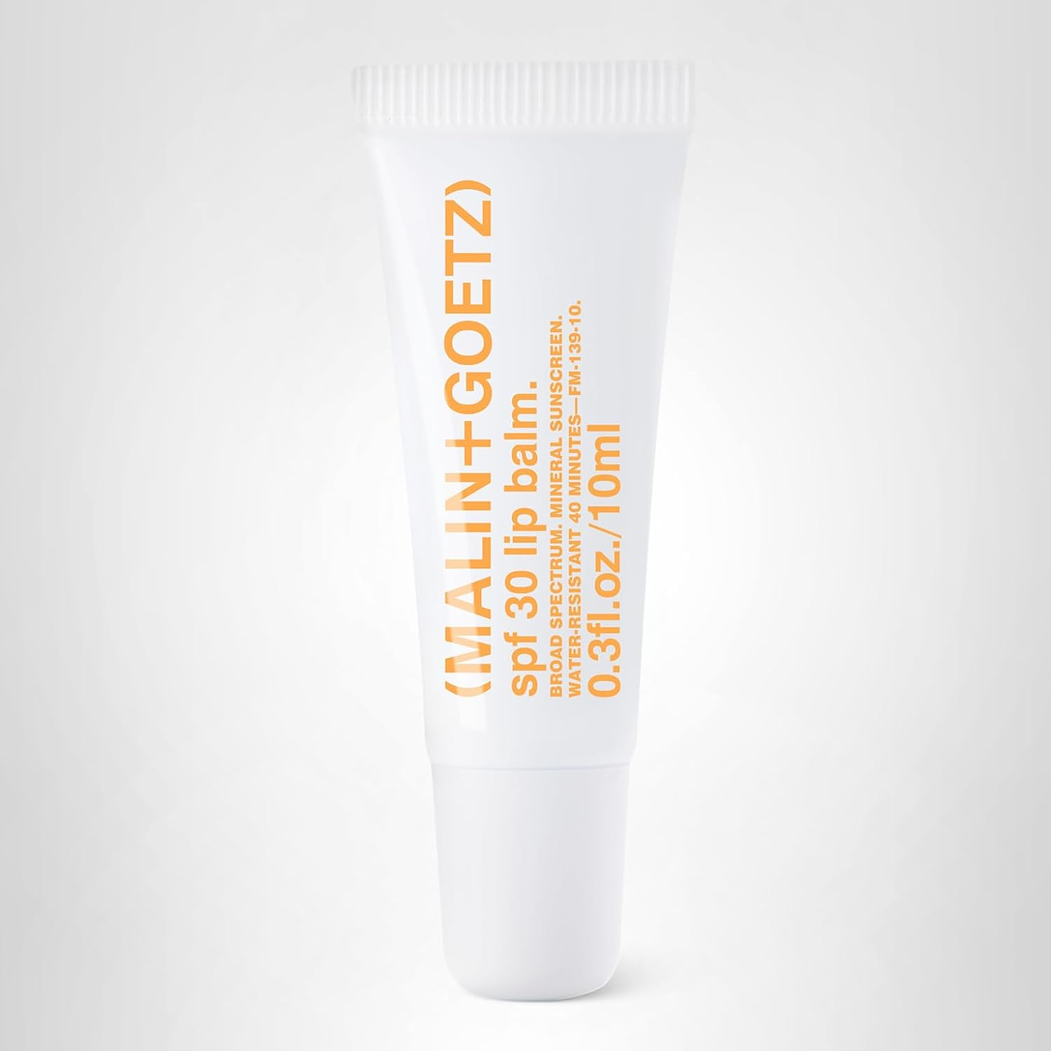 The best moisturizing lip SPF for dry chapped lips by MALIN+GOETZ 2026 on a white background