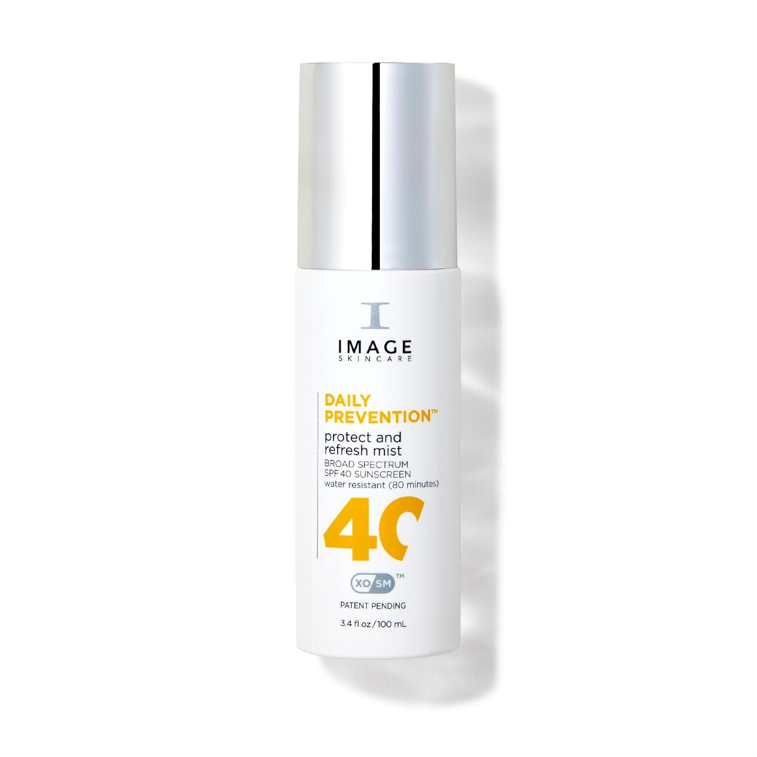The best dewy dry-oil SPF setting spray for dry skin by IMAGE Skincare 2026 on a white background