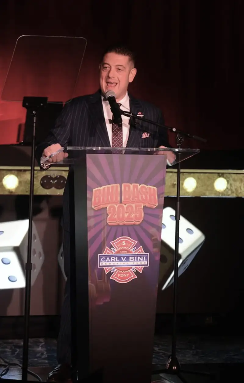 Massimo DiDonna speaking at a Carl V. Bini Memorial Fund event