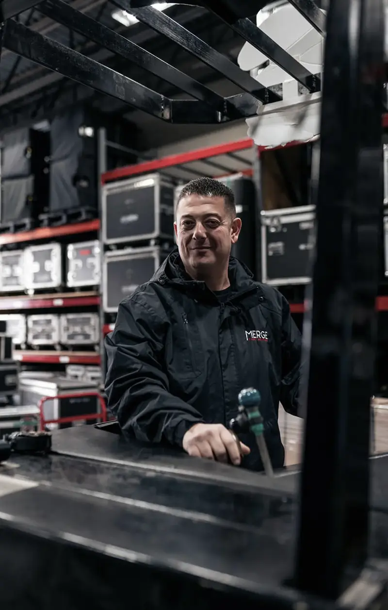 Massimo DiDonna in an event production warehouse