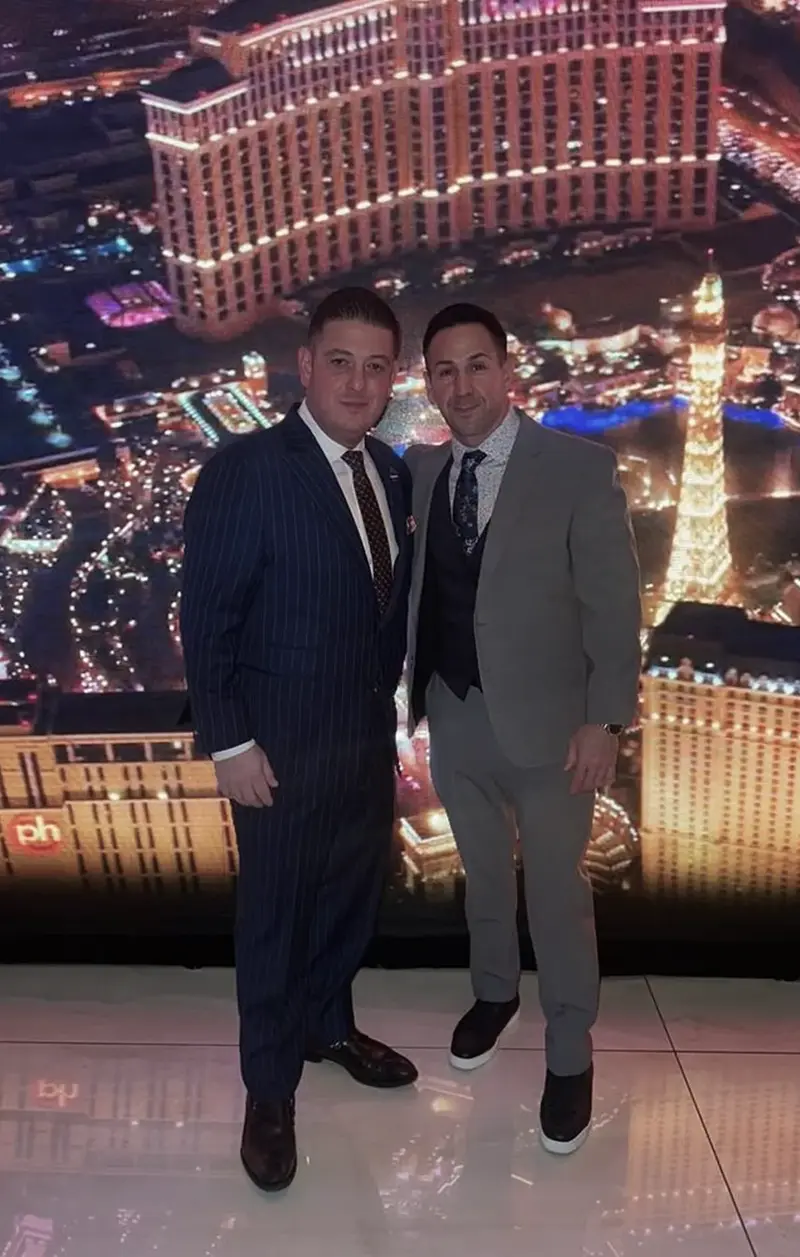 Massimo DiDonna with a guest at an evening event