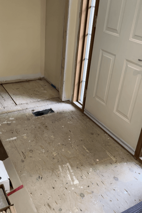 Fresh Beginnings: New White Walls Set the Stage for Renovation, Trim Work Awaited