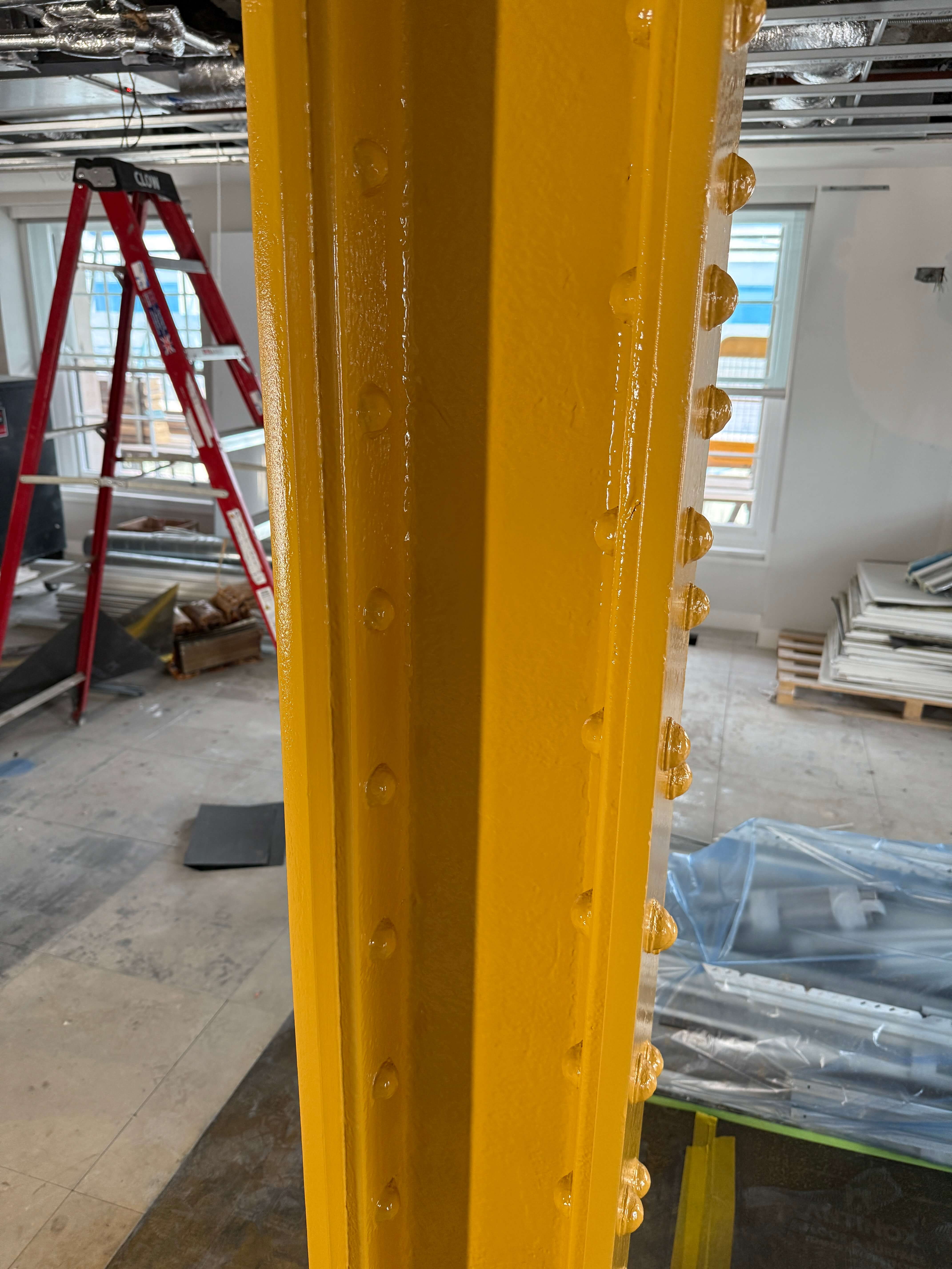 close up of yellow zinc phosphate primer coat