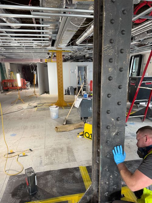 cleaning a steel beam ready for intumescent coating