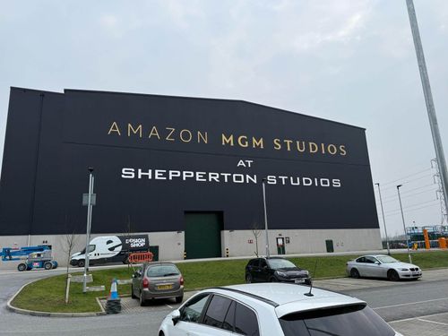 On-site commercial spray painting team working on Shepperton Studios project.
