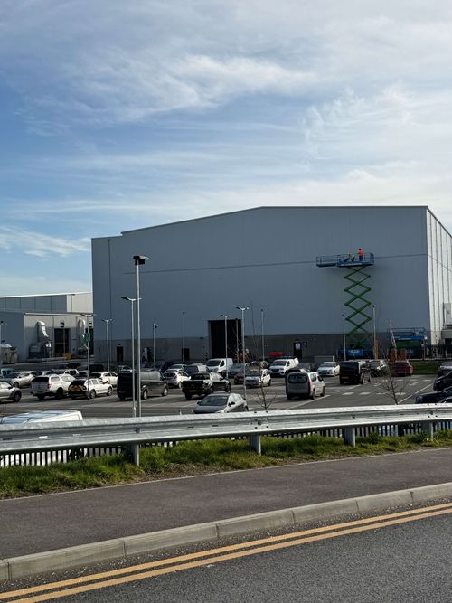 Exterior cleaning of cladding before applying industrial coatings at Shepperton Studios.