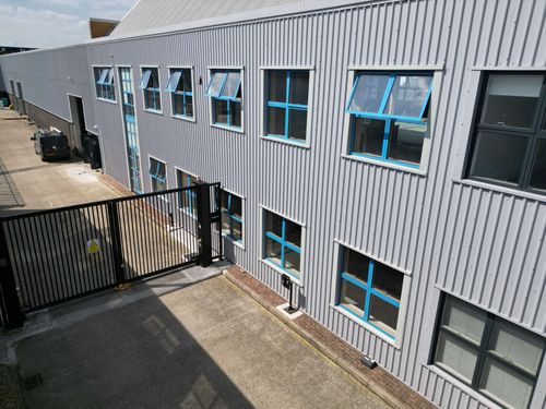 Masking paper secured with precision tape under all windows.