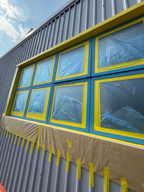 Tidy finish around edges using precision masking techniques.