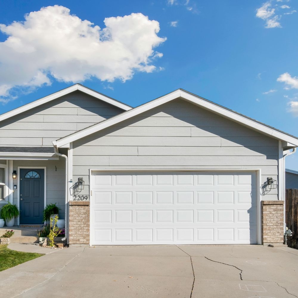 White Garage Door on Modern Home