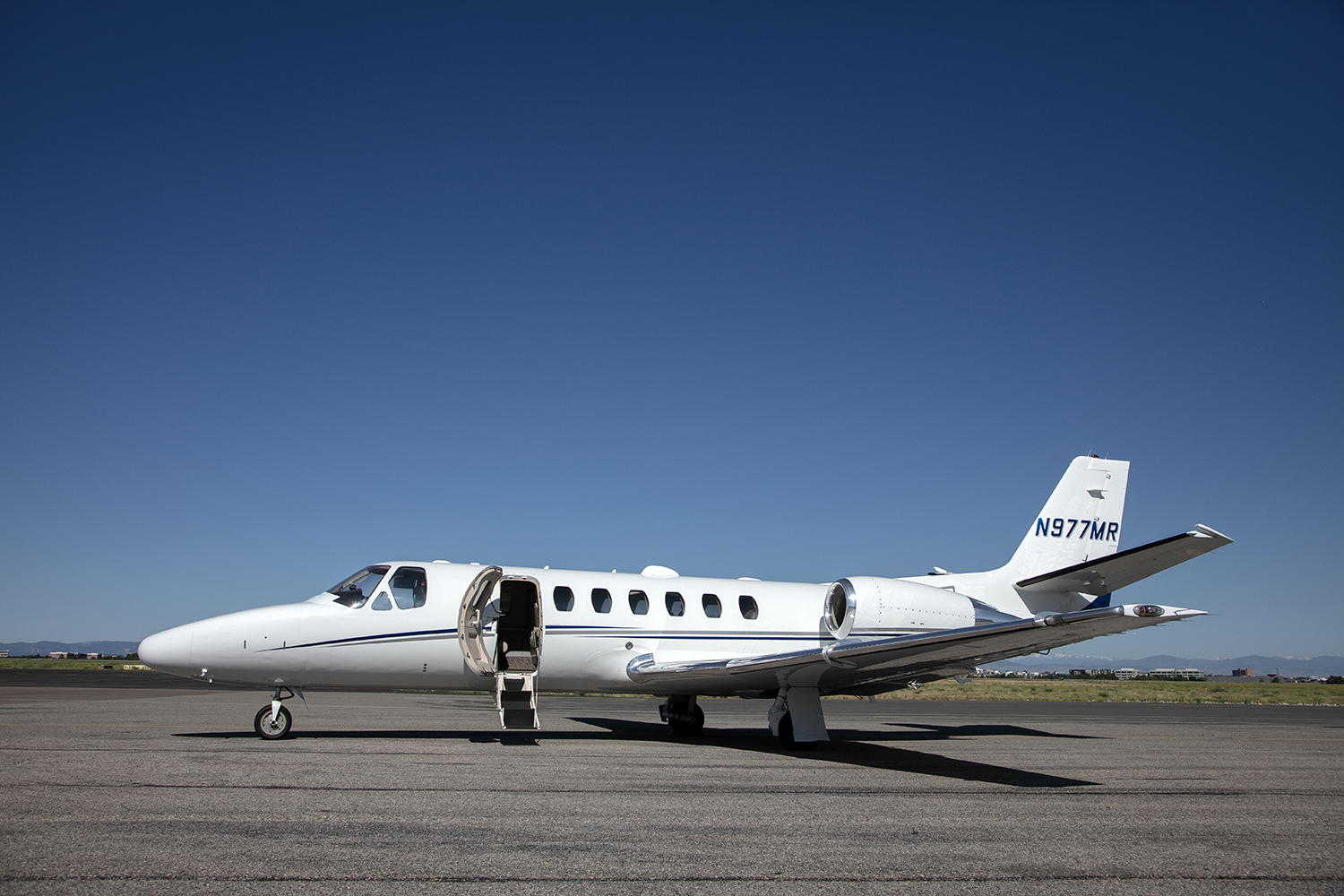 A private airplane with the door open