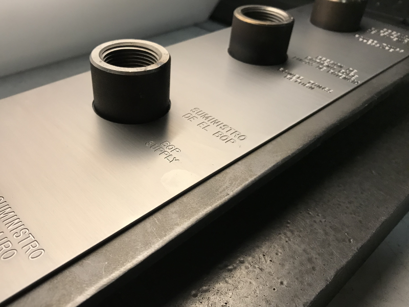 A photo of an engraved data plate in RGB