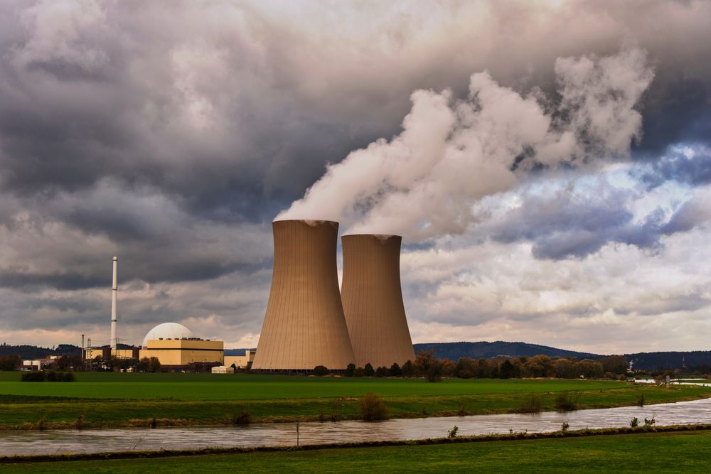 Nuclear power plant cooling towers releasing steam