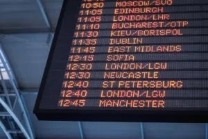 visual of screen with flight departure times