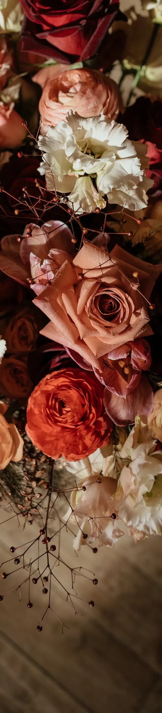 a bouquet of flowers against original hardwood floor
