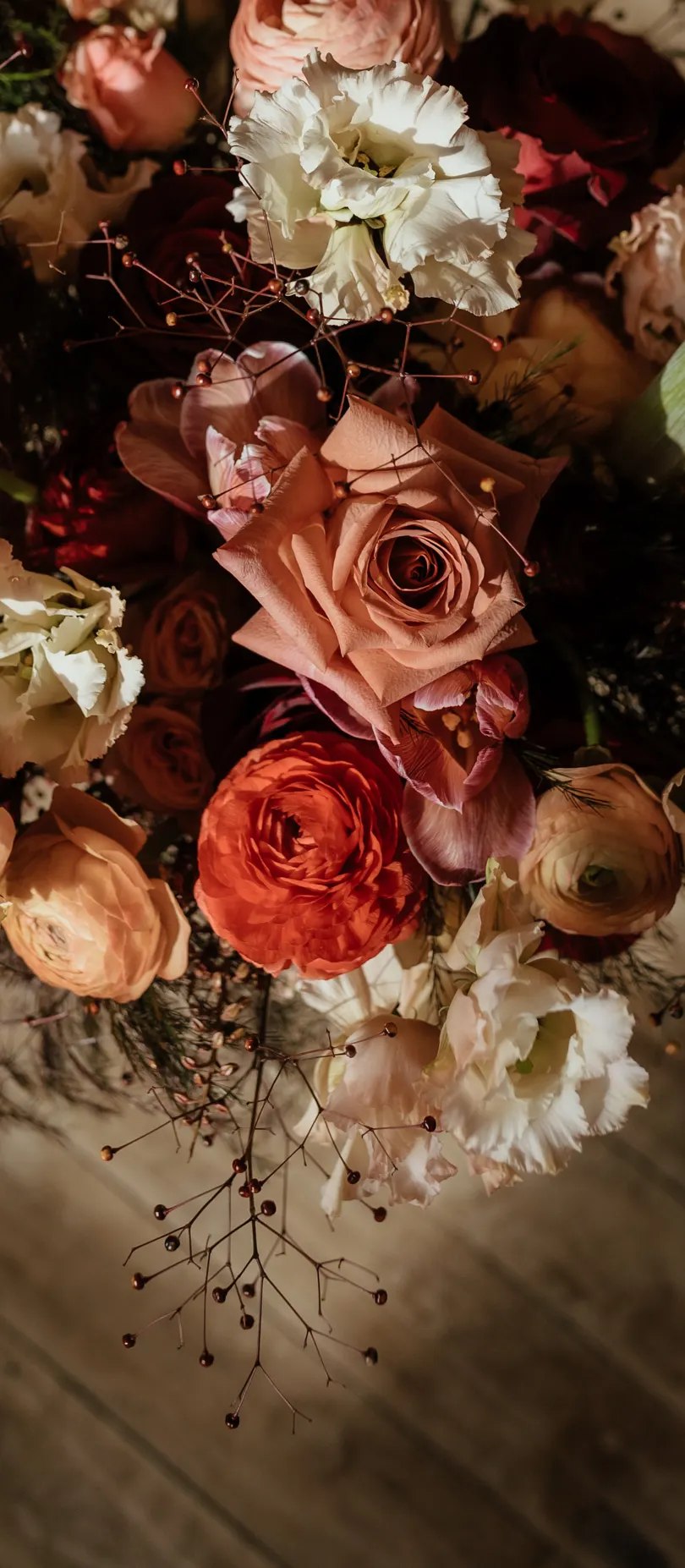 bouquet of flowers against original hardwood floors