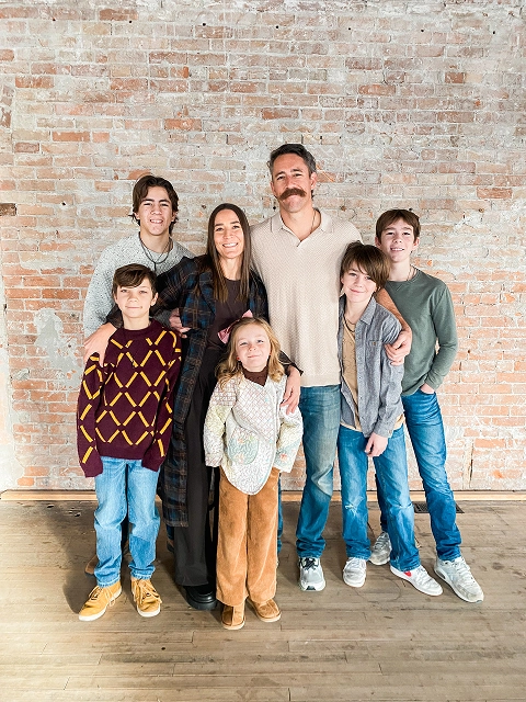 Heggie family in Freddy's on Main's brick loft wedding venue