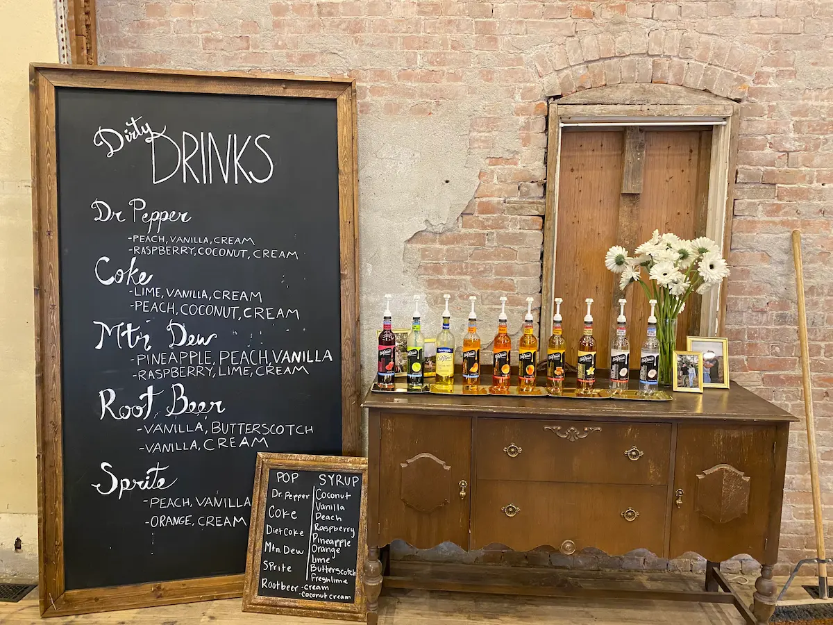 The refreshment station styled against the exposed brick walls