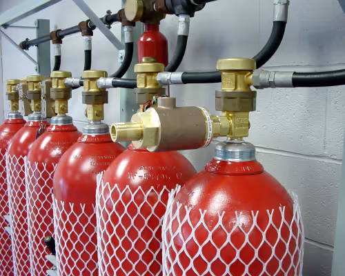 A row of fire extinguishers.