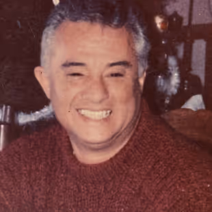A photo of Felix Martinez smiling.