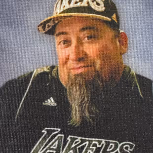 A photo of Steven Martinez in his Lakers merch.
