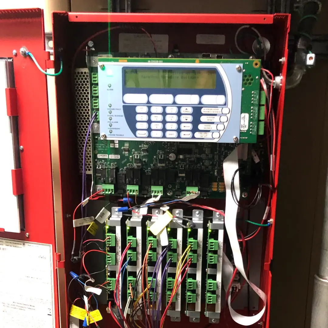 Open fire alarm system panel.