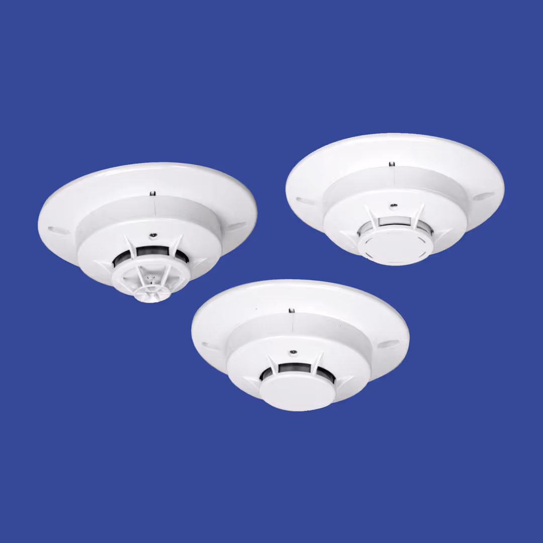 3 white smoke detectors.