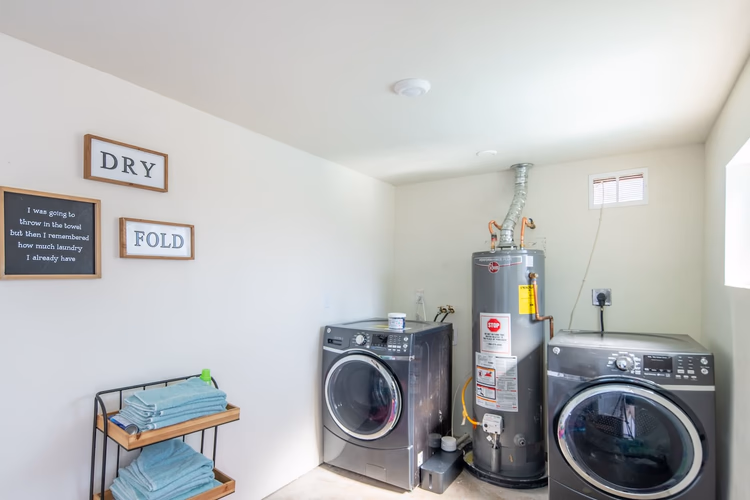 https://upcdn.io/W23MTH6/image/uploads/2025/07/27/4jcwMKdsDW-WasherDryerInTheShed.jpg?f=avif&w=900&h=500&fit=cover&quality=60