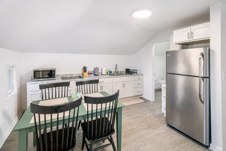 https://upcdn.io/W23MTH6/image/uploads/2025/07/30/4jcR9aoTK8-311%20West%20Park%20Ave%20Loft7.jpg?f=avif&w=900&h=500&fit=cover&quality=60