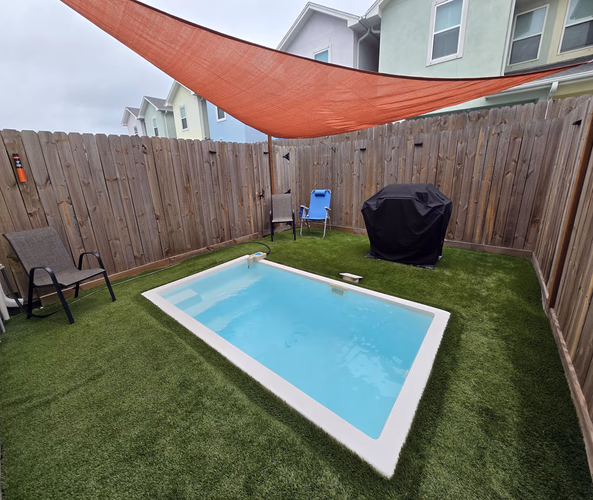 https://upcdn.io/W23MTH6/image/uploads/2025/08/21/4jZYeAYjKd-Pool-with-sunshade.jpg?f=avif&w=900&h=500&fit=cover&quality=60