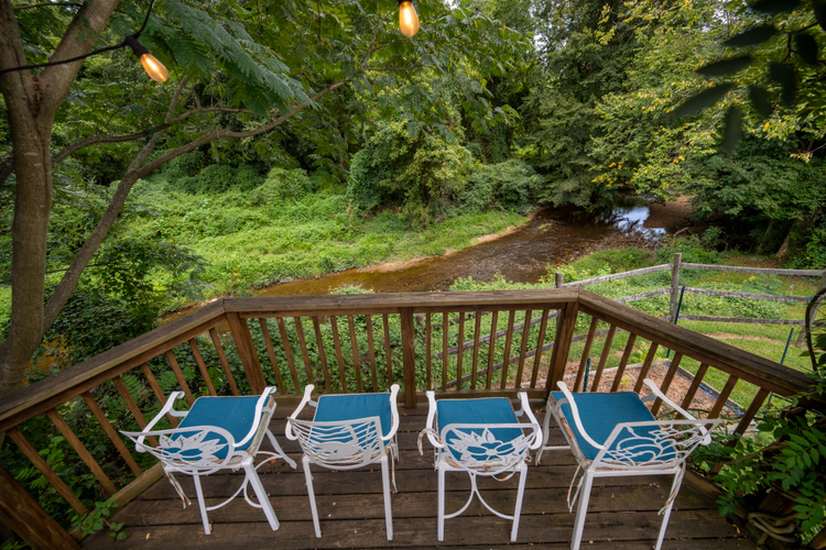 https://upcdn.io/W23MTH6/image/uploads/2025/09/10/4jWxKoVF2C-5601Bloomingdale-Deck%20overlooking%20creek51.JPG?f=avif&w=900&h=500&fit=cover&quality=60