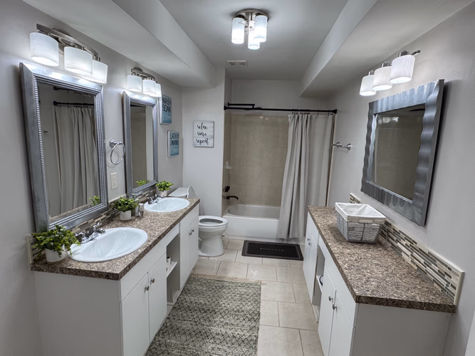 https://upcdn.io/W23MTH6/image/uploads/2025/09/14/4jWQLnWFKR-Double%20Vanity%20Bathroom.jpg?f=avif&w=900&h=500&fit=cover&quality=60