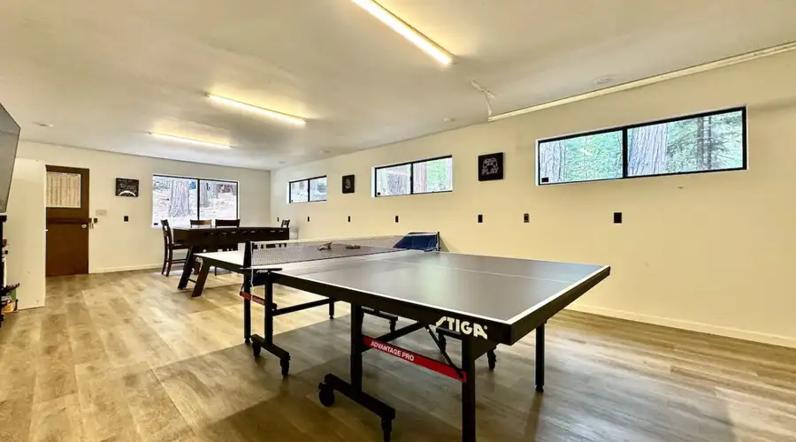 Treetop Cabin · Game Room · Fire Pit · Sleeps 8