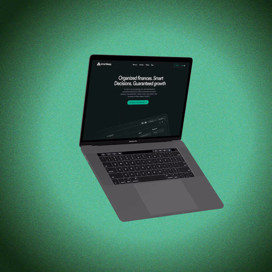 Open MacBook Pro laptop displaying Smartkeep website homepage with dark background and financial management text.