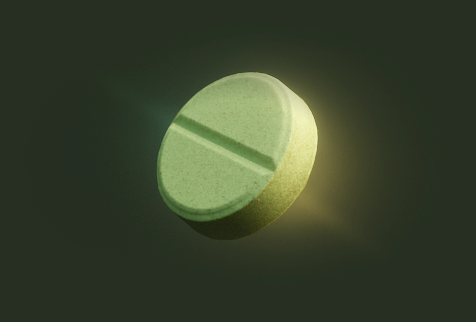 Round green tablet floating, emitting subtle glow