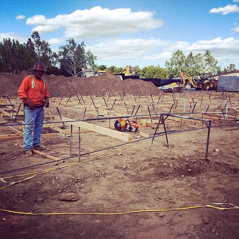 Cid's inspector checking rebar on a foundation pad