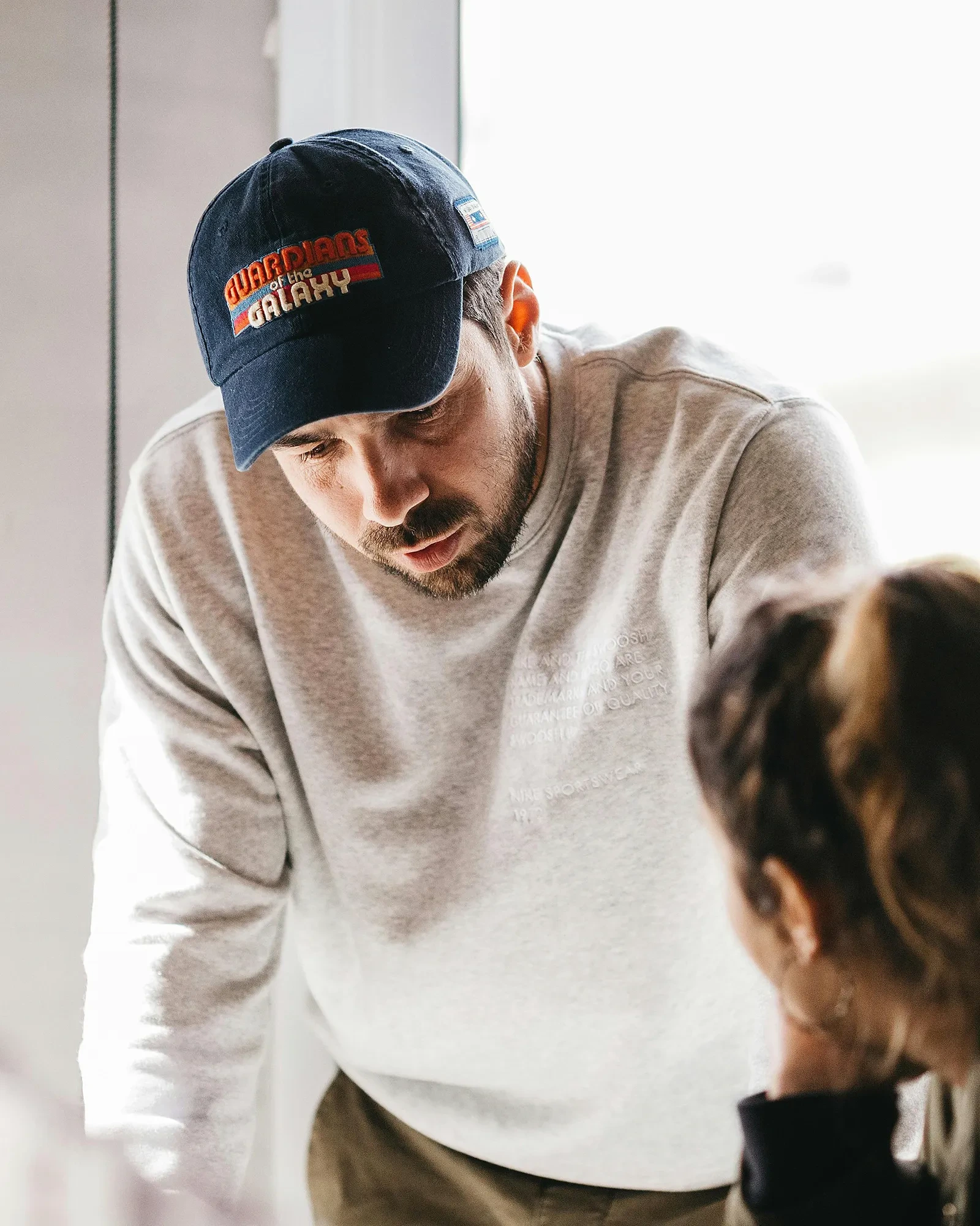 Man helping lady out with clarifications