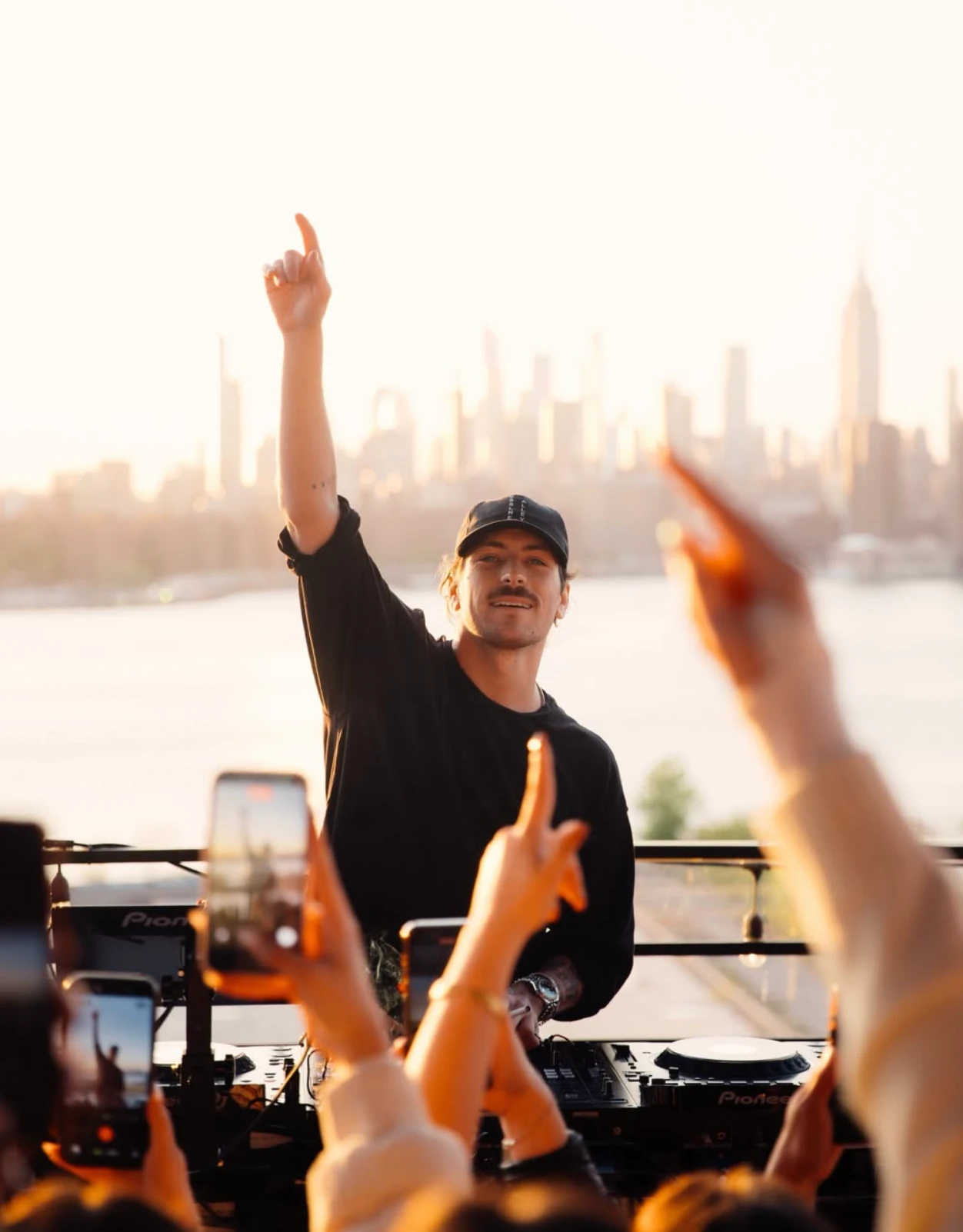 DJ set at Azure Day Party with the Manhattan skyline behind the decks