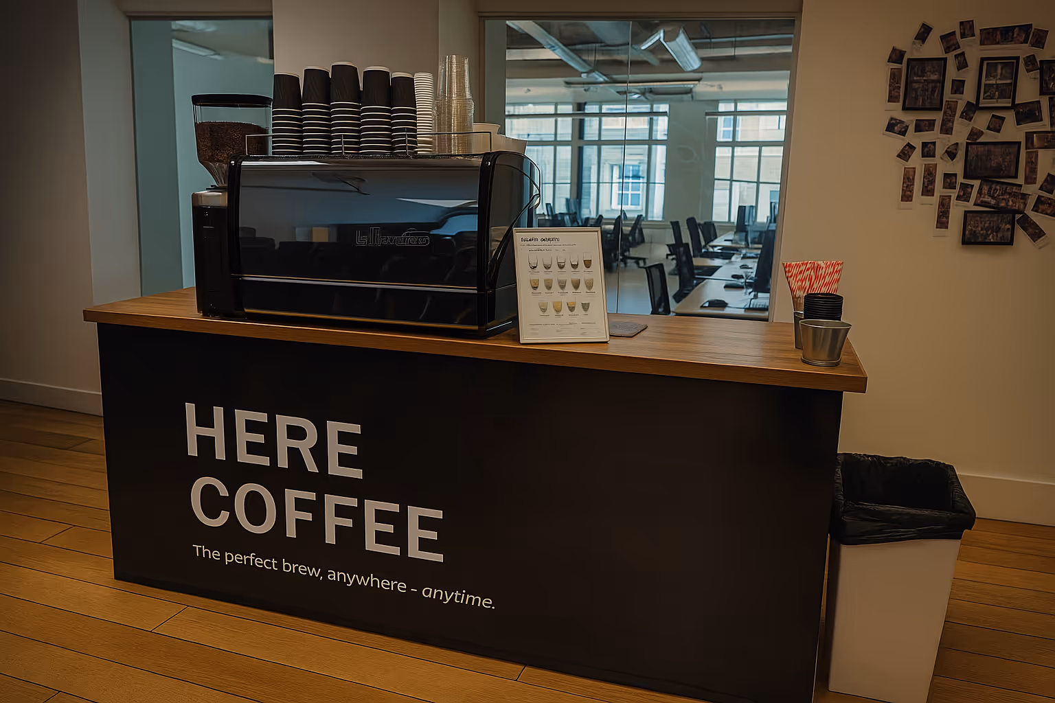 Website welcome section image of a Here Coffee branded takeaway cup being displayed on an espresso machine