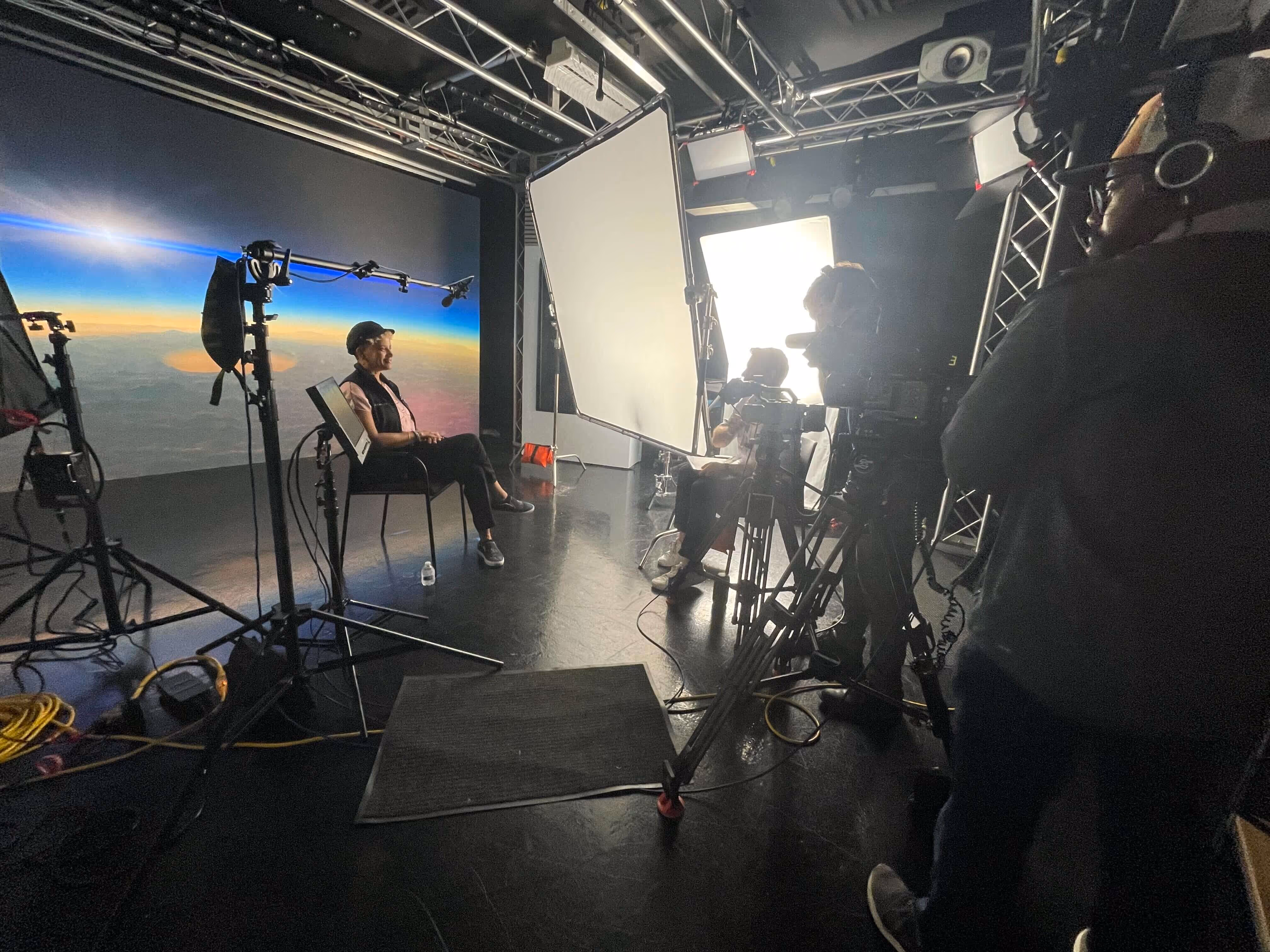 Behind the scenes of a video production led by Colt Bradley, documentary filmmaker