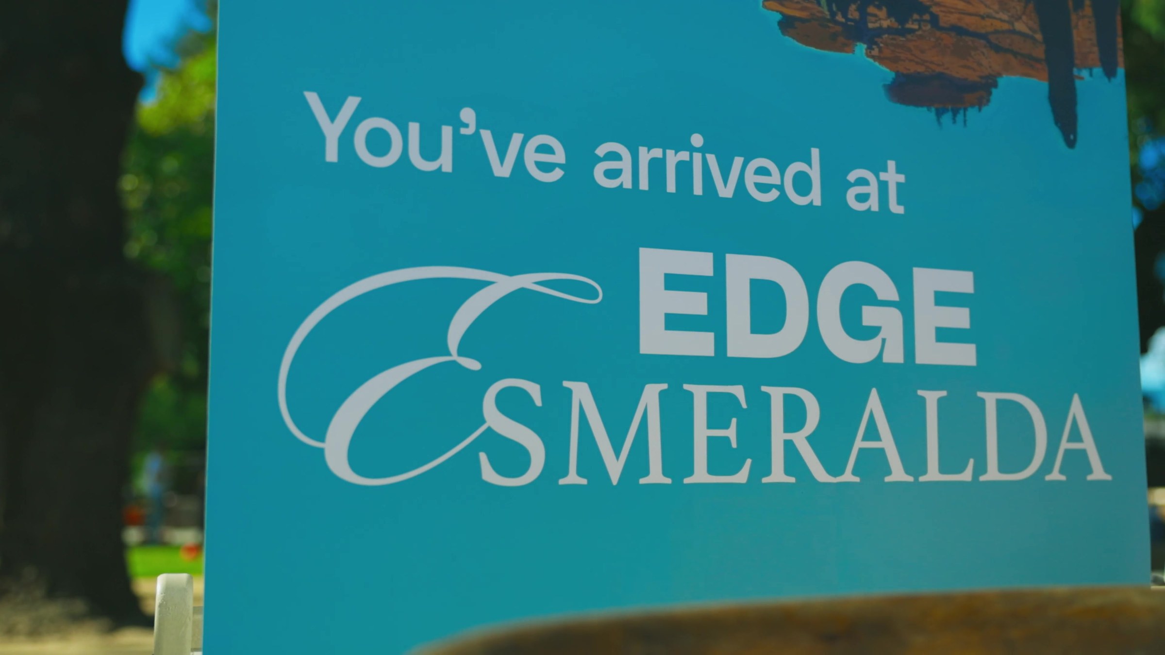 Welcome sign reading You have arrived at Edge Esmeralda
