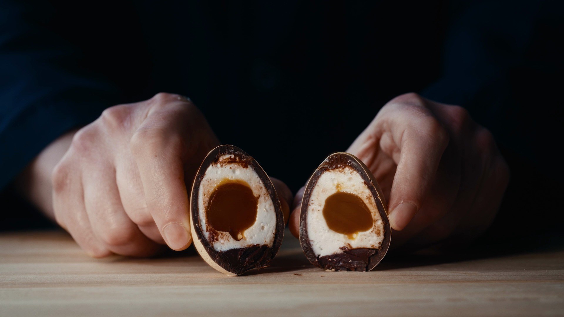 The Dandelion Signature Easter Egg cut open to reveal marshmallow and caramel yolk