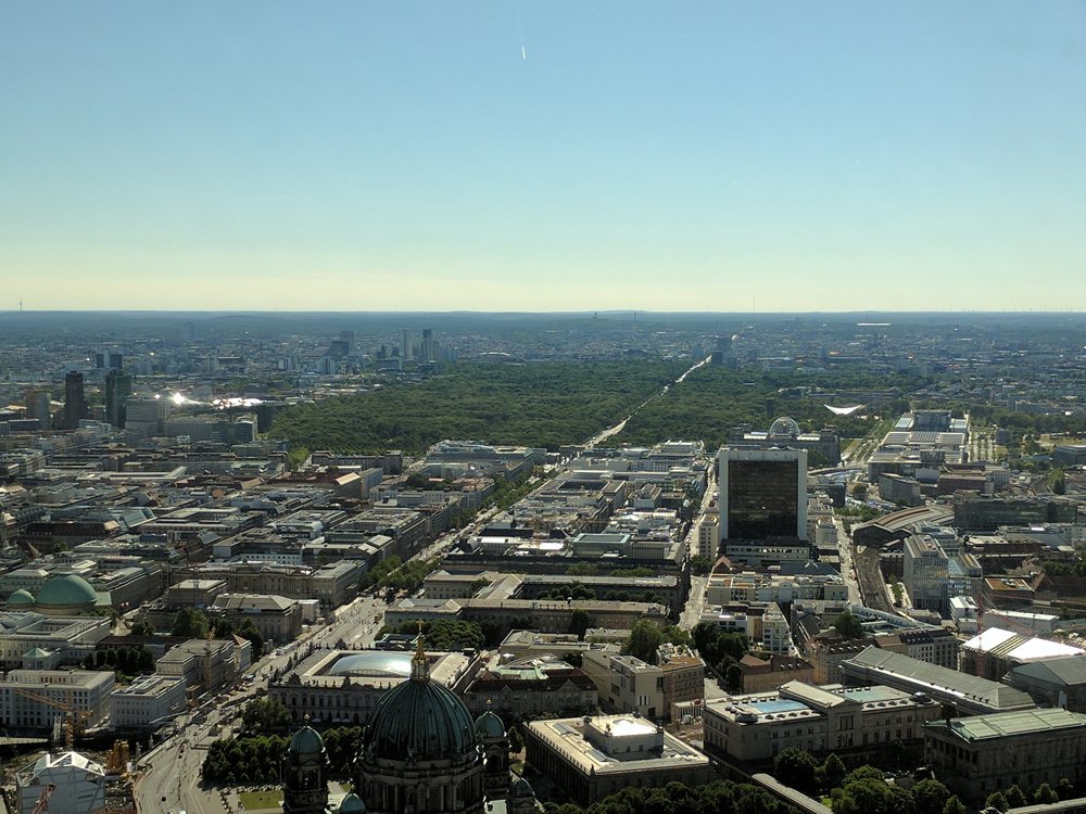 View of Berlin from the Fernsehturm with the Brandenburger Tor & Tierpark in distance Photo Credit: Jonathan Morgan