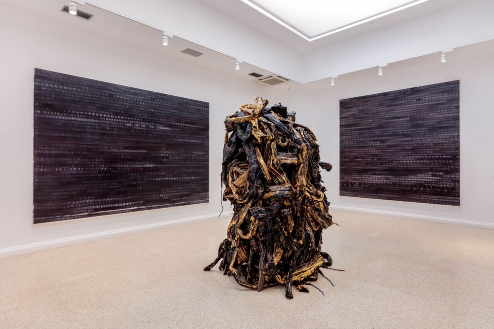 “Thelxiepeia” (left), “Leucosia” (right), and “Medusa” (center) by Mark Bradford, 2016  Photo Credit: Joshua White