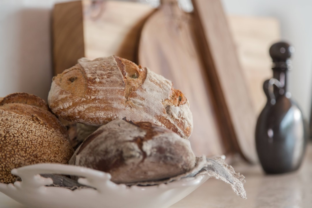 Sourdough bread basket with olive oil & balsamic vinegar showcasing restaurant branding and food styling