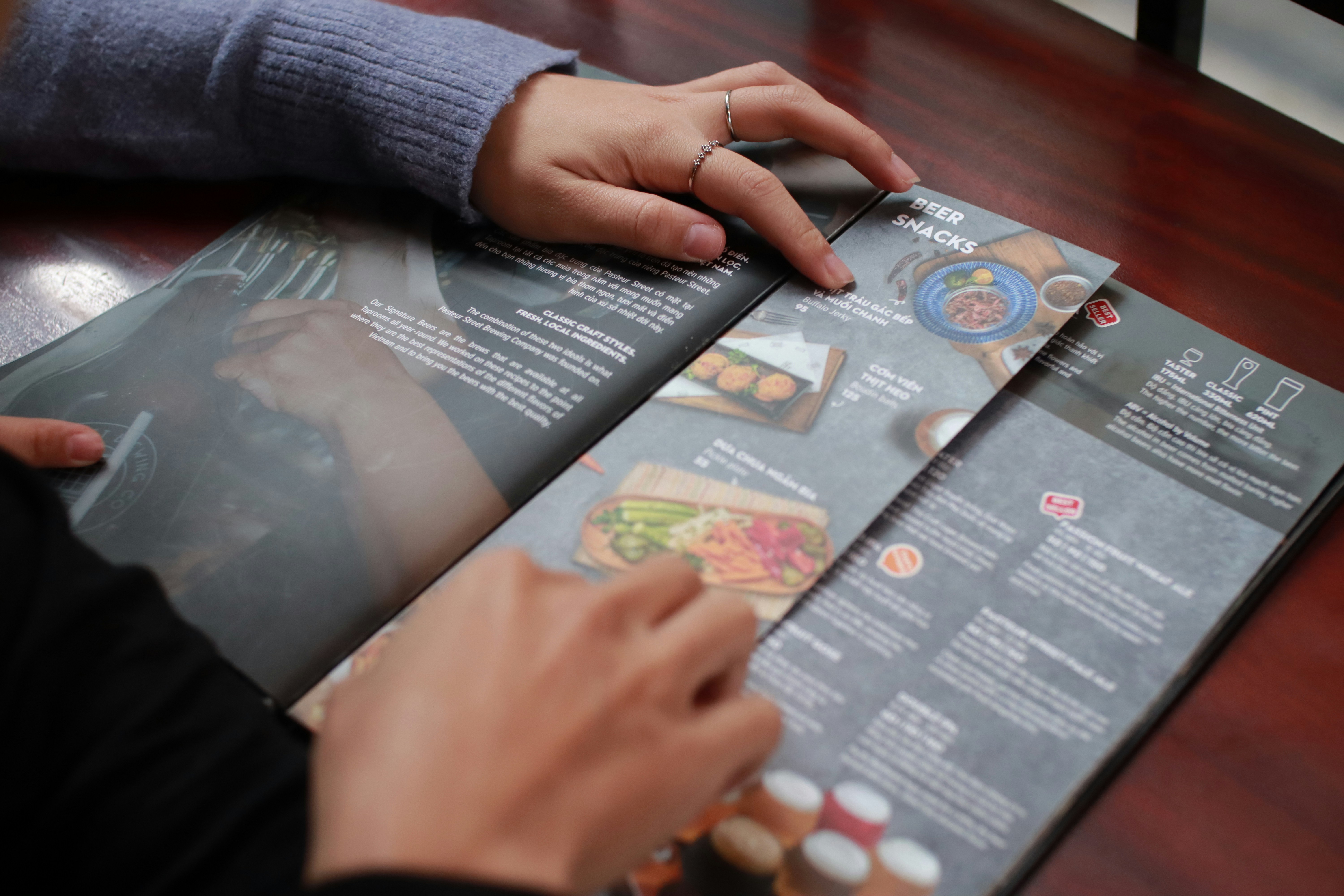Digital marketing for restaurants - person holding a branded restaurant package as part of an integrated marketing strategy